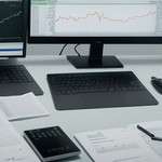 ภาพปกบทความ Investing ข่าว Forex วิเคราะห์ข่าวเศรษฐกิจเทรดค่าเงิน 2026 - ภาพถ่ายสมจริงแนวการเงิน iCafeForex